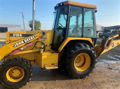 john deere 310d skid steer specs|jd 310 backhoe years made.